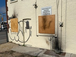 Burn marks are visible on the back of Manitoba cabinet minister Bernadette Smith's office in Winnipeg.