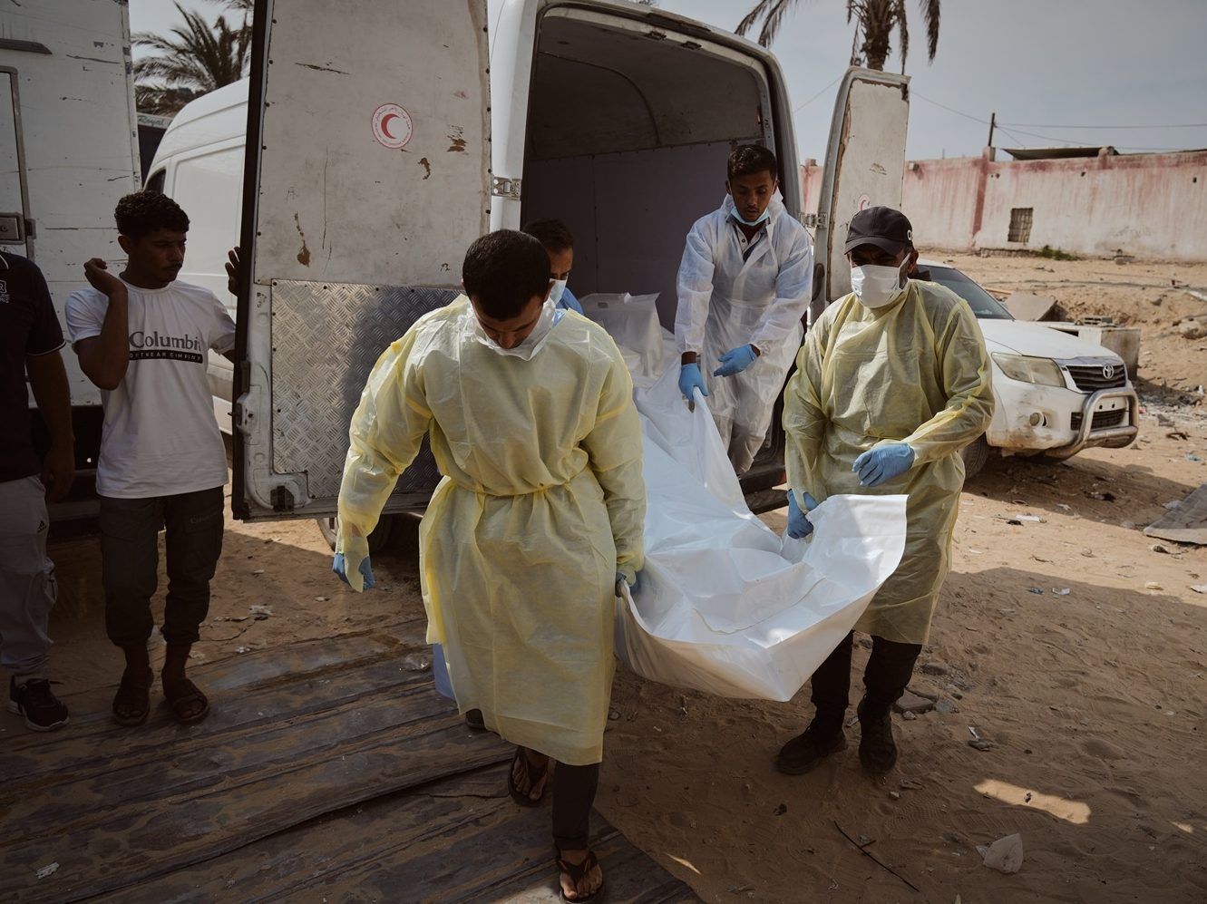 The bodies of unidentified Palestinians who returned from Israel as part of the ceasefire agreement are taken to Nasser Hospital in Khan Yunis, Gaza Strip, Monday, November 3, 2025. 