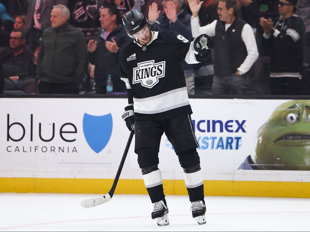 Los Angeles Kings right wing Adrian Kempe gestures after scoring a goal.