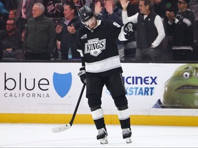 Los Angeles Kings right winger Adrian Kempe gestures after scoring a goal.