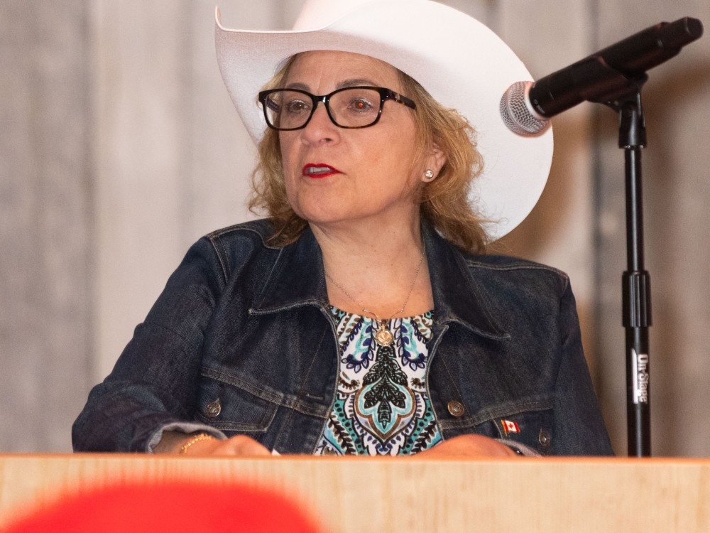  Lena Diab, Minister of Immigration, Refugees, and Citizenship Canada, speaks at a citizenship ceremony at the Calgary Stampede’s Sam Centre July 10, 2025.