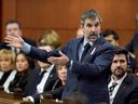 Canadian Identity and Culture Minister Stephen Guilbeault stands up during question period on Parliament Hill in Ottawa, Wednesday, Nov. 26, 2025.