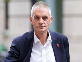 Outgoing BBC Director-General Tim Davie is seen outside BBC Broadcasting House in London, Tuesday Nov. 11, 2025.