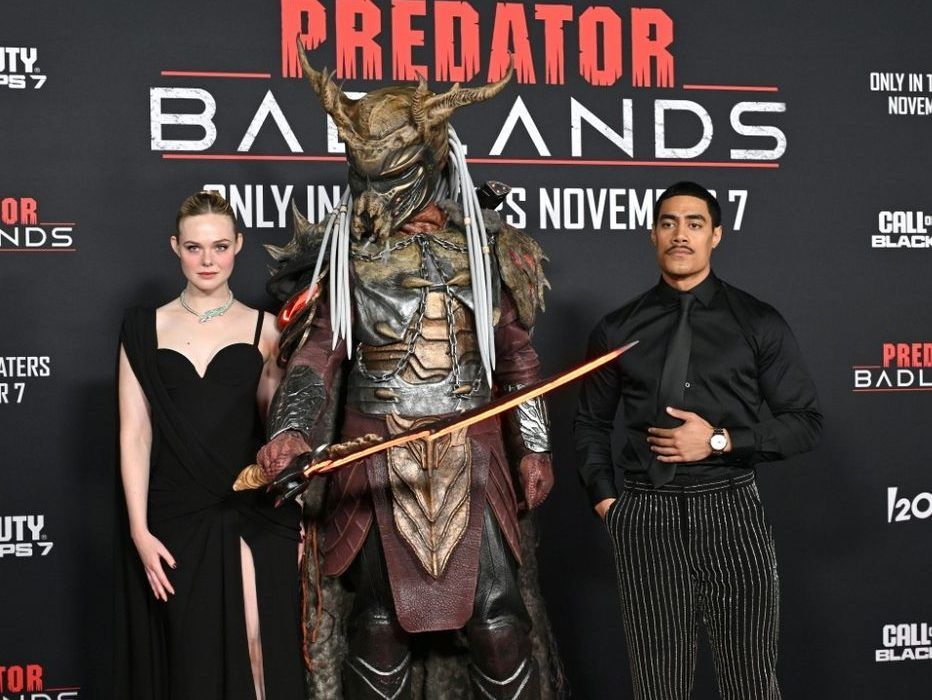 US actress Elle Fanning (L) and New Zealand actor Dimitrius Schuster-Koloamatangi star in 'Predator: Badlands'.