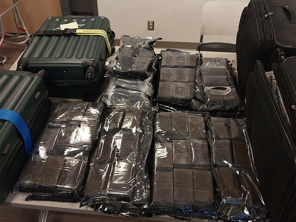 Two men charged after 60 kilos of drugs seized at Calgary airport