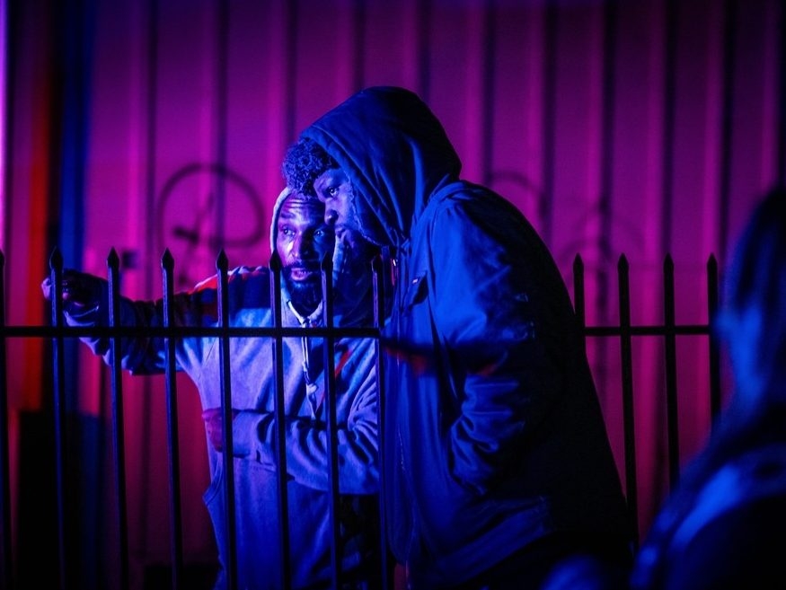  Bystanders watch at the scene of a mass shooting Saturday, Nov. 29, 2025, in Stockton, Calif.