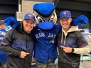 Jared Roth and Josh Carlson meet with Blue Jays mascot Ace before Game 7 of the World Series in Toronto, Saturday, November 1, 2025.