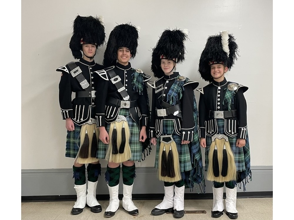  From left, Thelonious Tracy, 14, Haroon Awan, 14, Maya Croome, 12, and Iona Lees, 12, were among Paris Port Dover pipe band who played with Paul McCartney in Hamilton. (Courtesy of Paris Port Dover pipe band.)
