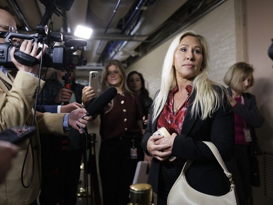  Rep. Marjorie Taylor Greene (R-Georgia) speaks to reporters in April at the Capitol. MUST CREDIT: Tom Brenner/For The Washington Post