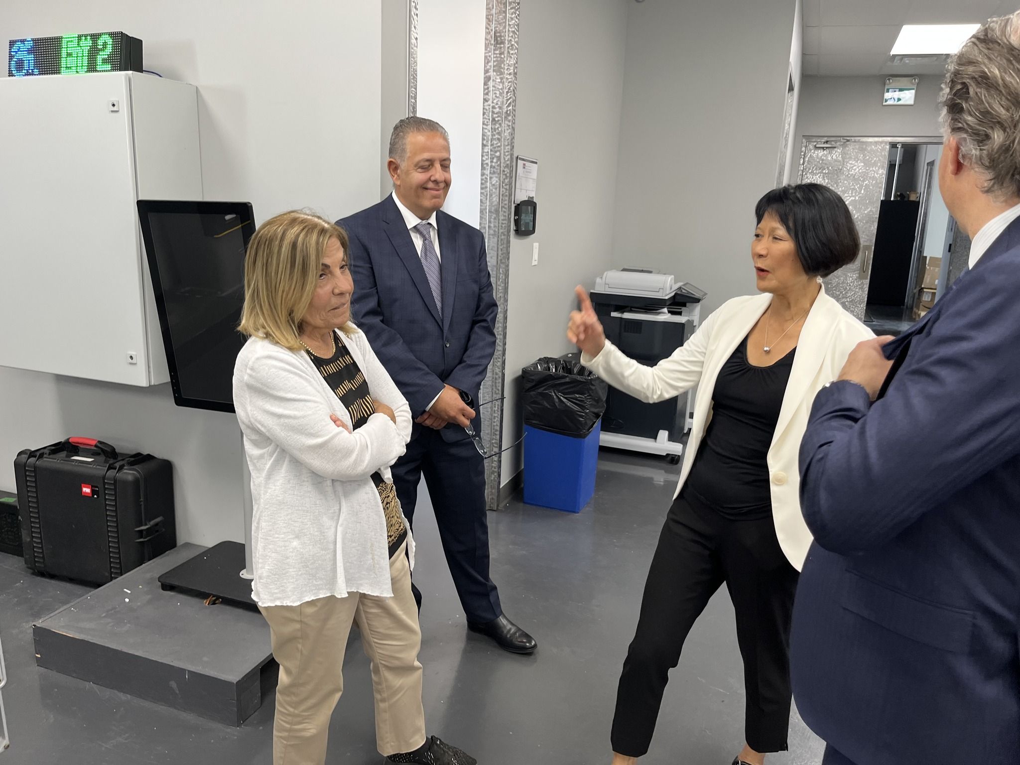Councillor Frances Nunziata, left, and Mayor Olivia Chow, right, get a tour of Precise ParkLink, a business in Nunziata’s ward, on Sept. 11, in an image posted to Facebook. It’s believed the man at centre is Precise ParkLink COO Luigi Lato.