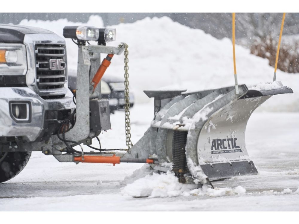 Snow cleared outside Arctic Plow’s plant in London, Ontario, Canada. (Geoff Robins/AFP)