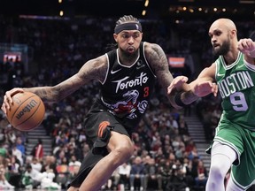 Toronto Raptors forward Brandon Ingram (3) drives against Boston Celtics guard Derrick White.
