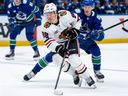 Chicago Blackhawks centre Connor Bedard handles the puck during a game against the Vancouver Canucks.