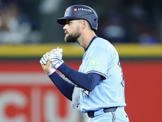 Nathan Lukes of the Toronto Blue Jays reacts after hitting a double against the Seattle Mariners during the American League Championship Series.