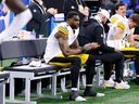 Pittsburgh Steelers' DK Metcalf sits on the bench during the second half of Sunday's game against the Detroit Lions.