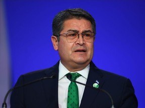 Honduran President Juan Orlando Hernandez speaks at the opening ceremony of the UN Climate Change Conference COP26 in Glasgow, Scotland, Monday, November 1, 2021.