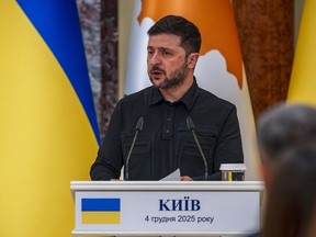 Ukrainian President Volodymyr Zelenskyy attends a joint news conference with Cyprus' President Nikos Christodoulides in Kyiv, Ukraine, Thursday, Dec. 4, 2025.