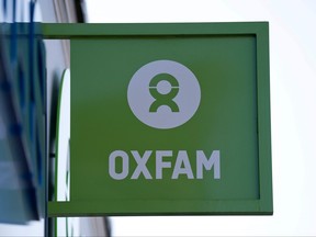 Oxfam signage is pictured outside an Oxfam charity shop in London on Feb. 17, 2018.