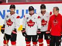 Canadian 4 Nations Face-off forwards (from left) Sam Bennett, Seth Jarvis and Anthony Cirelli listen to head coach Jon Cooper at a practice at the Bell Centre in February. Bennett and Jarvis are not on the Canadian Olympic team for Milan, but Cirelli is back.