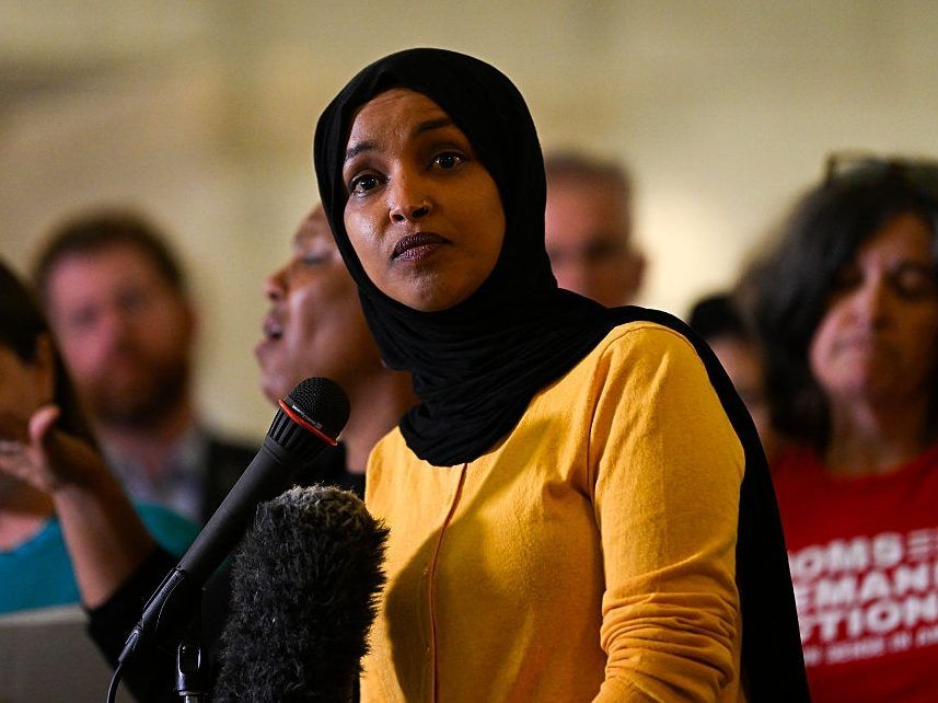 U.S. Rep. Ilhan Omar (D-MN) (C) speaks during a press conference at City Hall following a mass shooting at Annunciation Catholic School on August 28, 2025 in Minneapolis, Minnesota.
