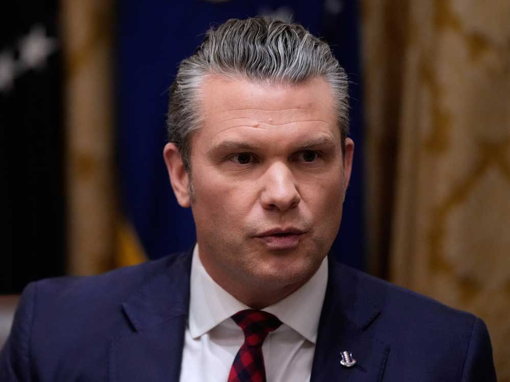 Defense Secretary Pete Hegseth speaks during a Cabinet meeting at the White House, Tuesday, Dec. 2, 2025, in Washington.