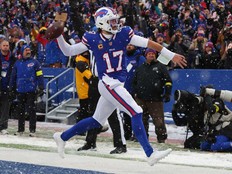 Buffalo Bills quarterback Josh Allen reacts after running for a touchdown against the Cincinnati Bengals during the second half of an NFL football game, Sunday, Dec. 7, 2025, in Orchard Park, N.Y.