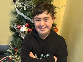 Leo Tarr, 13, at a Variety Village Christmas tree in Scarborough.