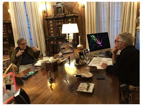 This undated photo from the personal collection of Jeffrey Epstein provided by the Democrats on the House Oversight Committee on Dec. 12, 2025, shows former Trump adviser Steve Bannon (left) speaking with Epstein.