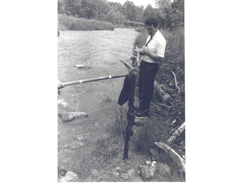  Investigators examine items found near the crime scene in the Christine Prince murder CREDIT: Toronto Police