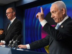 Israeli Prime Minister Benjamin Netanyahu speaks to the media during a joint press conference with German Chancellor Friedrich Merz in Jerusalem Sunday, Dec. 7, 2025.