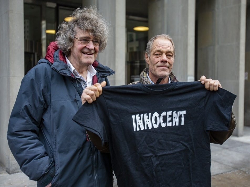  After 36 years, the Crown withdrew a murder charge against Timothy Rees as he walks out a free and innocent man as he leaves the courthouse at 361 University Ave. in Toronto on Thursday, Dec. 18, 2025. Rees poses for a picture with defence lawyer James Lockyer. Rees spent 23 years in jail for the death of Darla Thurrott, 10.