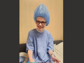 Zach Rayment hams it up with his surgical cap before heading into major surgery at Sick Kids. (BARB RAYMENT photo)