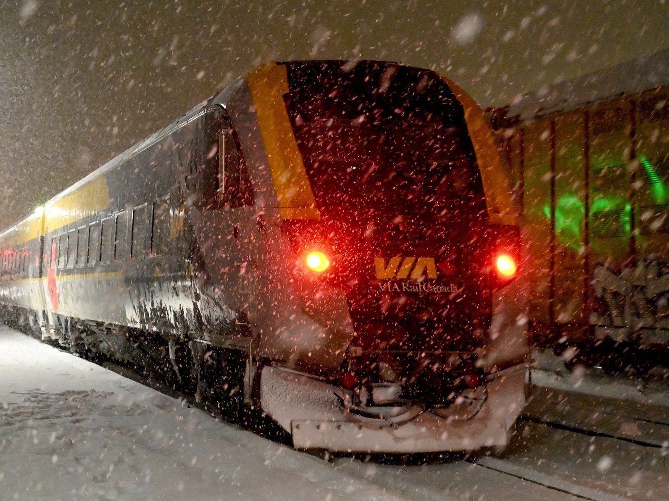 Train collides with snowplow, causing commuter chaos; damaged vehicle sought