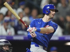 Chicago Cubs' Kyle Tucker hits an RBI single during a game against the Colorado Rockies last year.