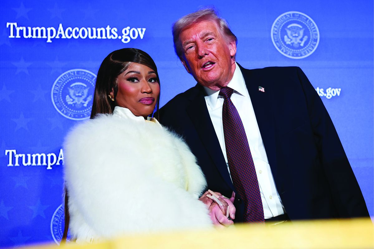 Rapper turned staunch MAGA supporter Nicki Minaj joins U.S. President Donald Trump on stage.