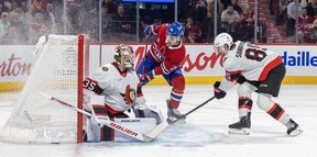 Montreal Canadiens forward Juraj Slafkovsky scores on Ottawa Senators goalie Linus Ullmark as defenceman Jake Sanderson gets there too late during the first period in Montreal on Tuesday, Dec. 2, 2025.