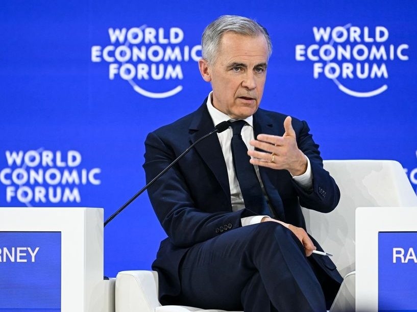  Prime Minister Mark Carney gestures as he speaks during the World Economic Forum (WEF) annual meeting in Davos on January 20, 2026.