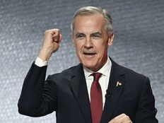 Mark Carney raises arm
