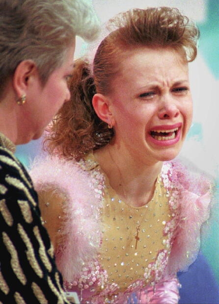 Oksana Baiul weeps tears of joy after seeing her marks giving her the gold medal.