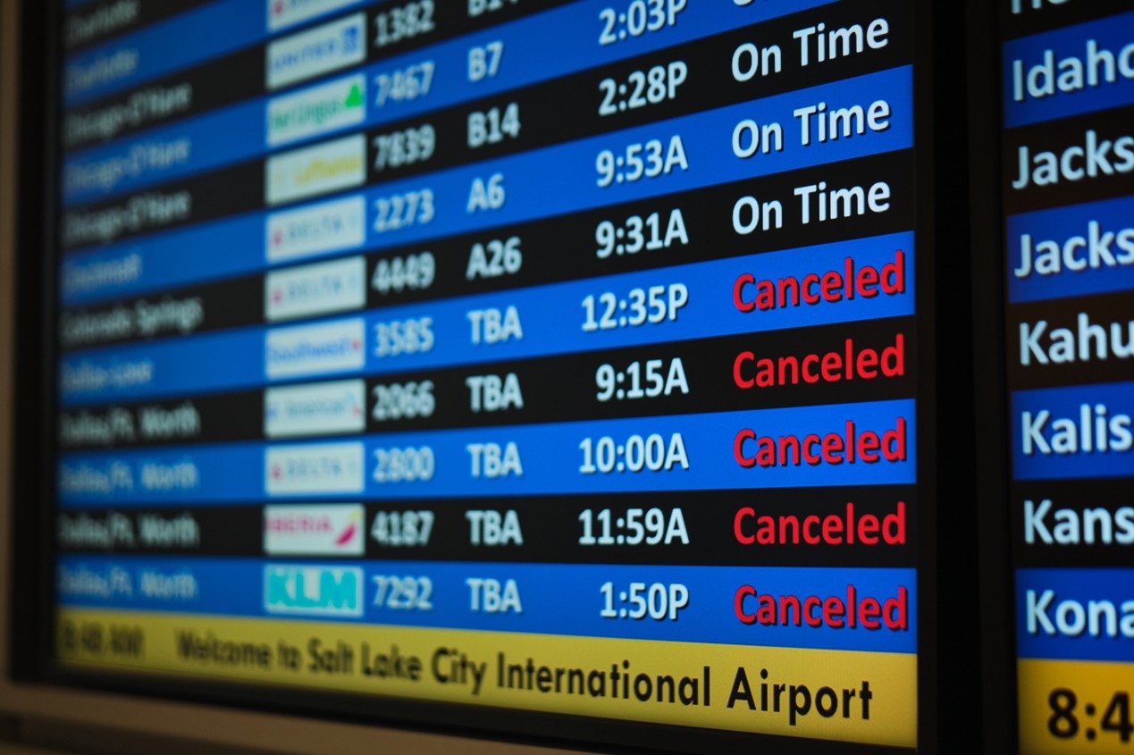  A flight status screen shows canceled flights to the Dallas-Fort Worth, Texas area from the Salt Lake City International Airport amid a winter storm Saturday, Jan. 24, 2026.