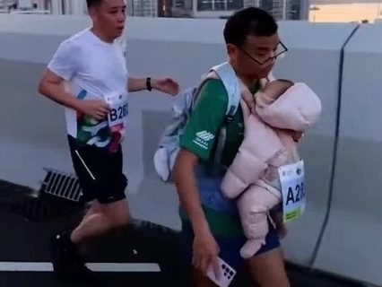 BABY IN TOW, HORROR UNVEILED: Marathon Man's Dark Secret EXPOSED!