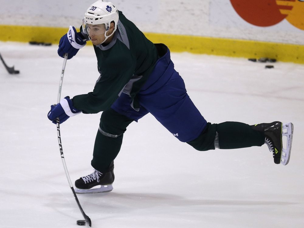 Former Toronto Maple Leafs forward David Booth takes part in practice in 2014.