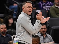 Toronto Raptors head coach Darko Rajakovic reacts during a gameagainst the Sacramento Kings last month.