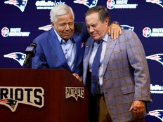 New England Patriots owner Robert Kraft (left) hugs former head coach Bill Belichick during a press conference in 2024.