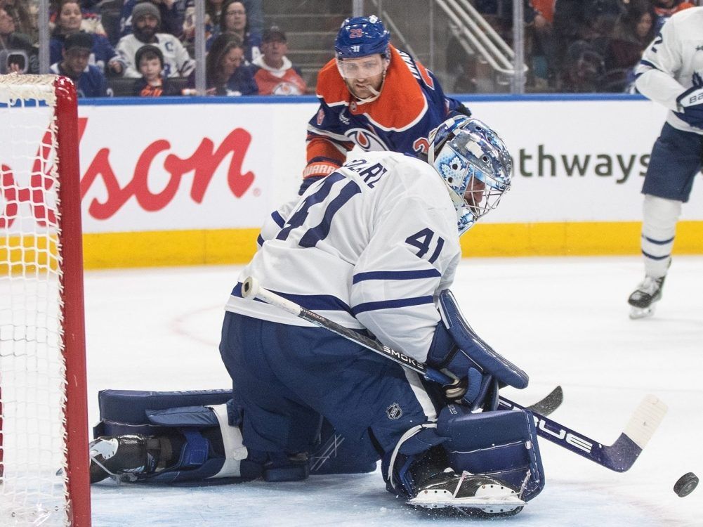 Toronto Maple Leafs goaltender Anthony Stolarz makes a save on Edmonton Oilers' Leon Draisaitl during second period NHL action, in Edmonton on Feb. 3, 2026.