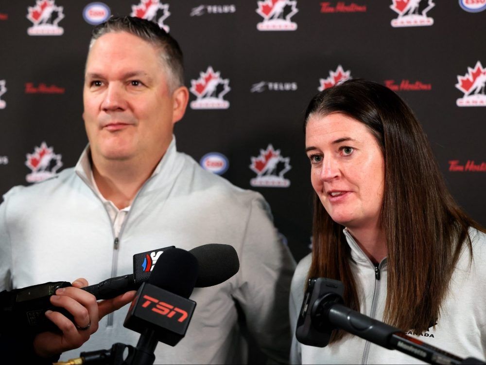 Canada’s national women’s hockey team head coach Troy Ryan (left) and general manager Gina Kingsbury.