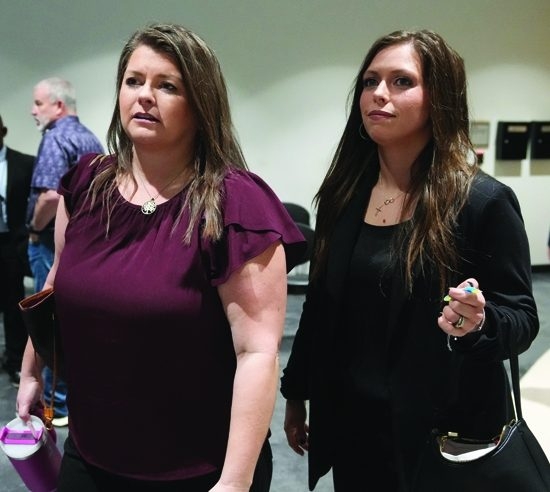  Kim Pierce, left, the widow of yogurt shop suspect Maurice Pierce, who died in 2010, and their daughter Marisa, arrive at the exoneration hearing for four men wrongfully accused in the 1991 Austin yogurt shop murders at the Blackwell-Thurman Criminal Justice Center in Austin on Thursday, Feb. 19, 2026.