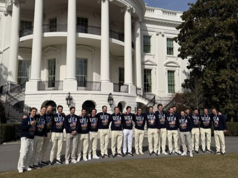 The U.S. men’s Olympic hockey team poses for a photo outside of the White House on Tuesday.