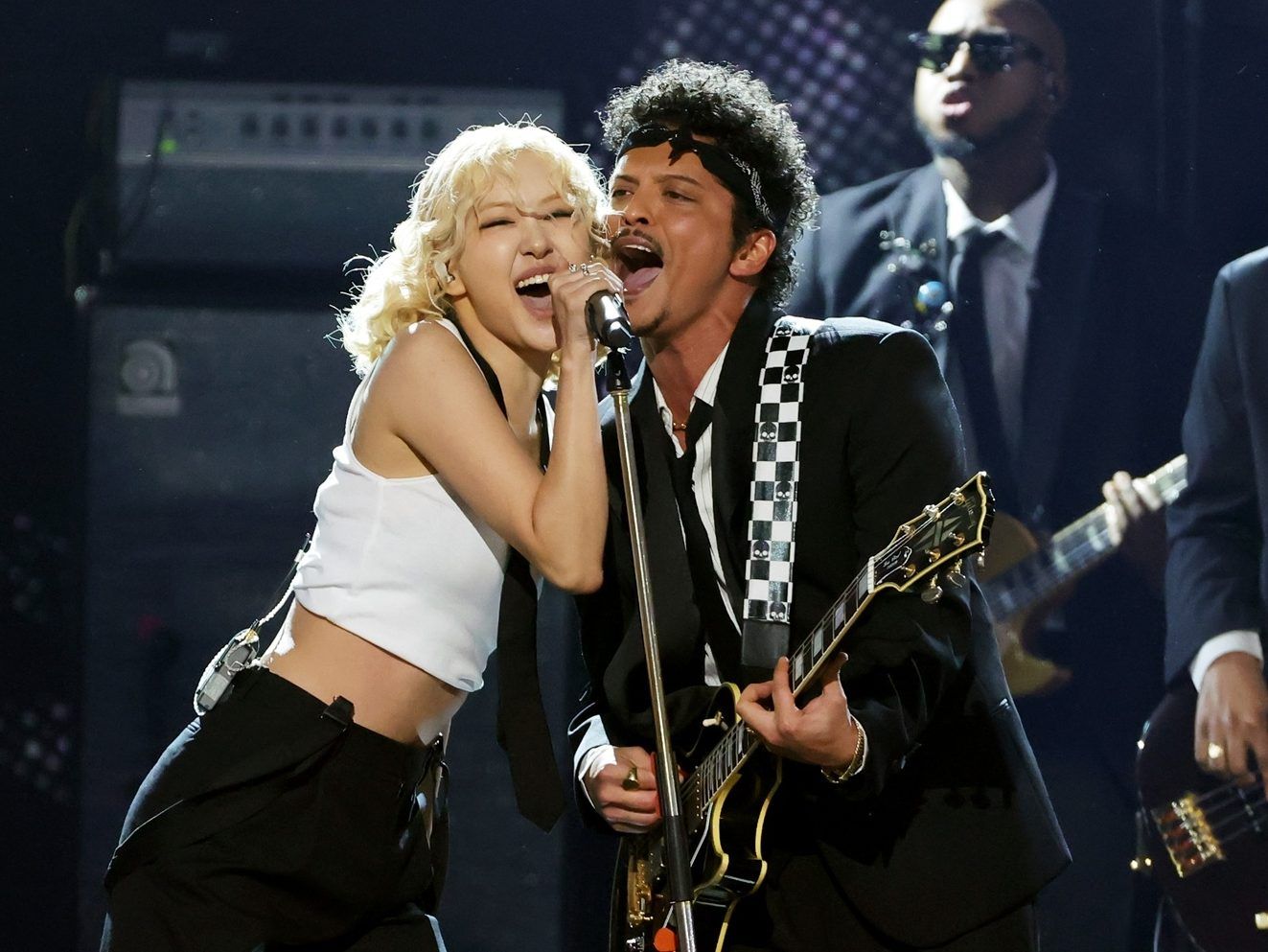 Rosé and Bruno Mars perform onstage during the 68th Grammy Awards.