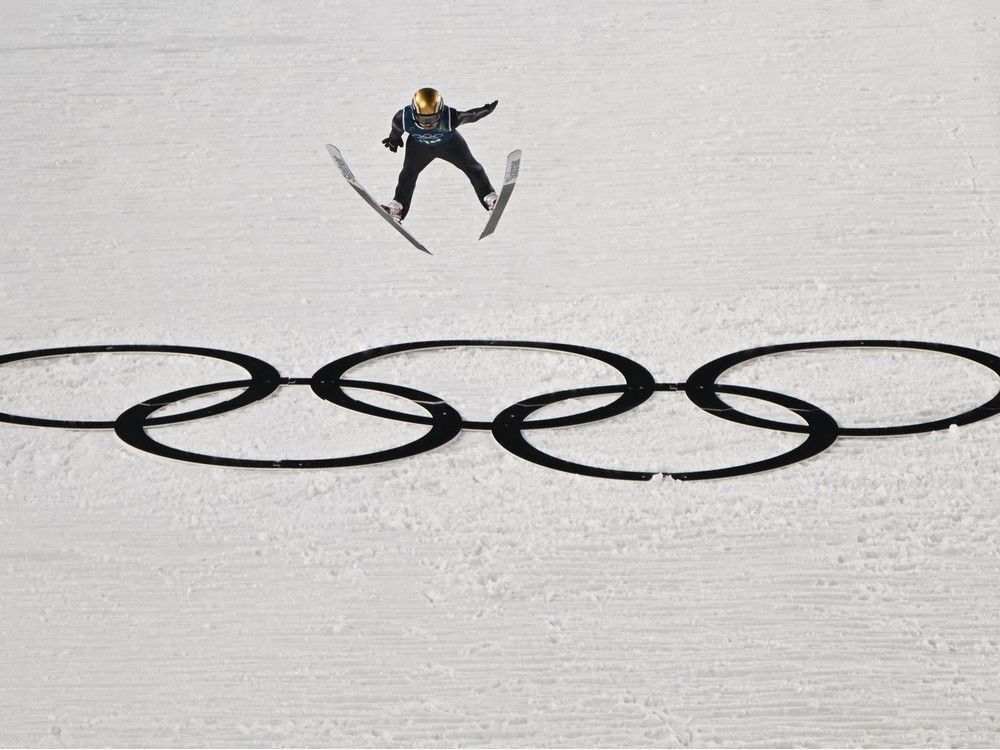 Bulgaria's Vladimir Zografski jumps during the men's ski jumping normal hill training of the Milano Cortina 2026 Winter Olympic Games at Predazzo Ski Jumping Stadium in Predazzo (Val di Fiemme), on Feb. 5, 2026.